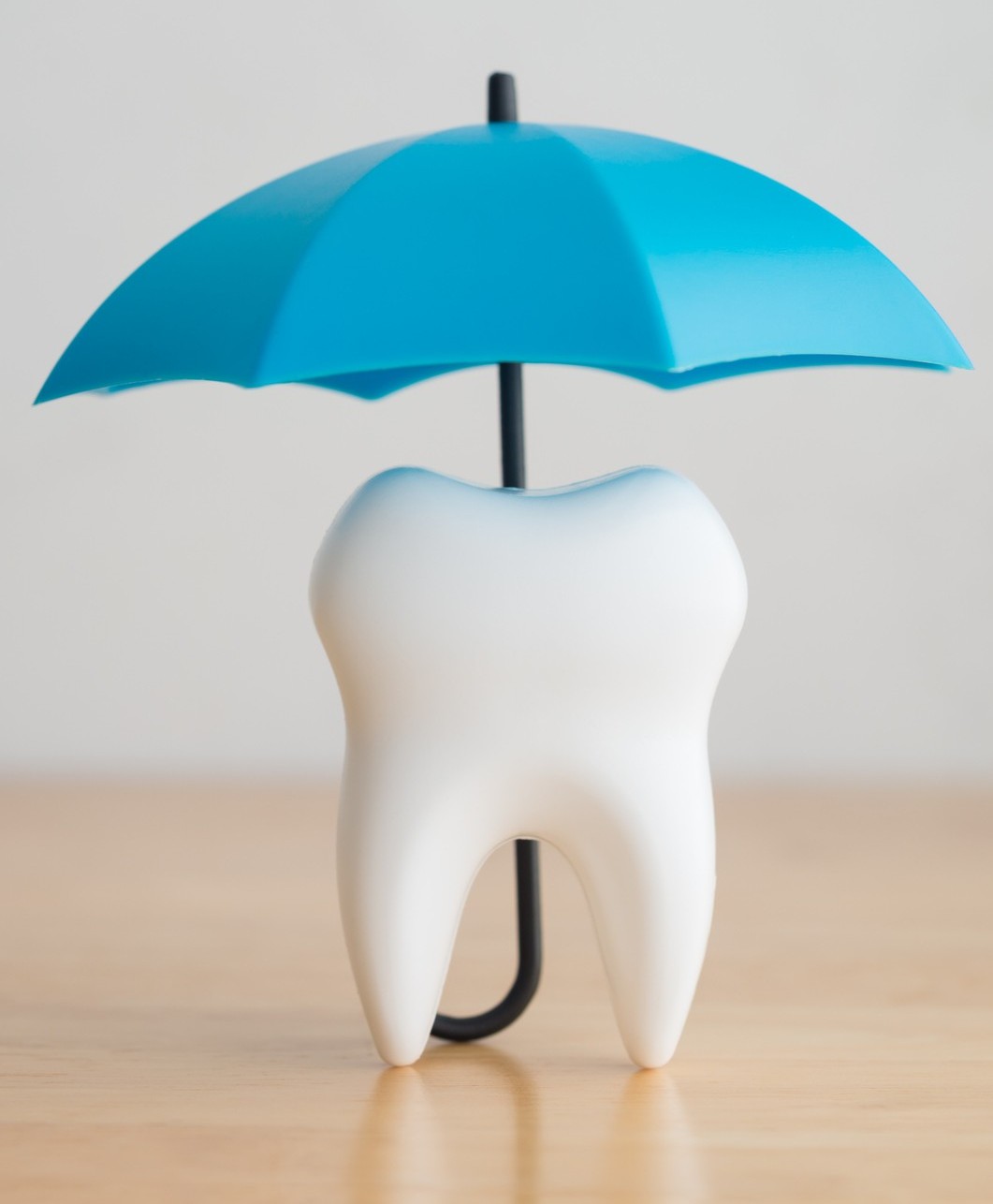 Tooth protection with umbrella display