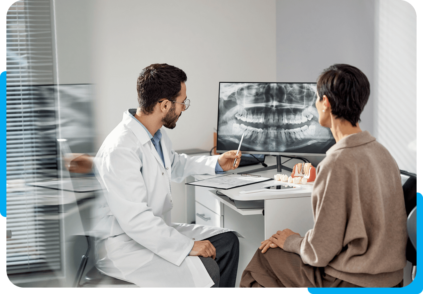 Doctor discussing dental health with patient