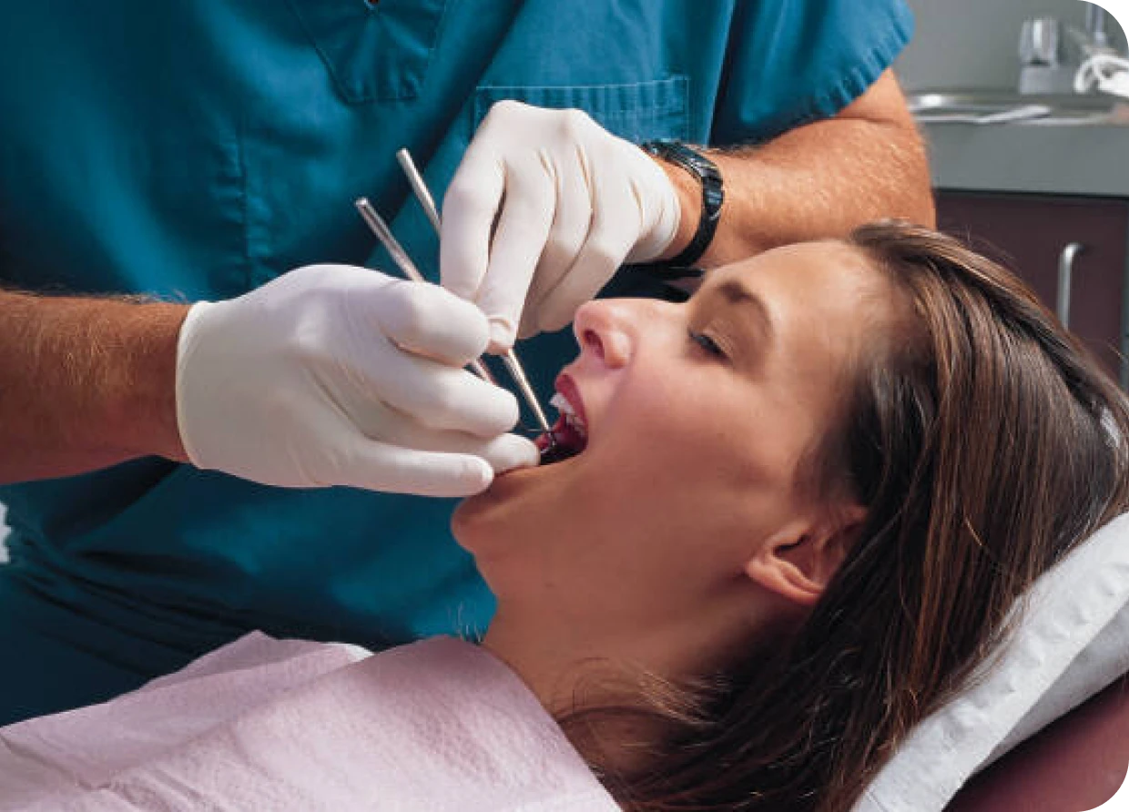 Woman receiving dental check-up